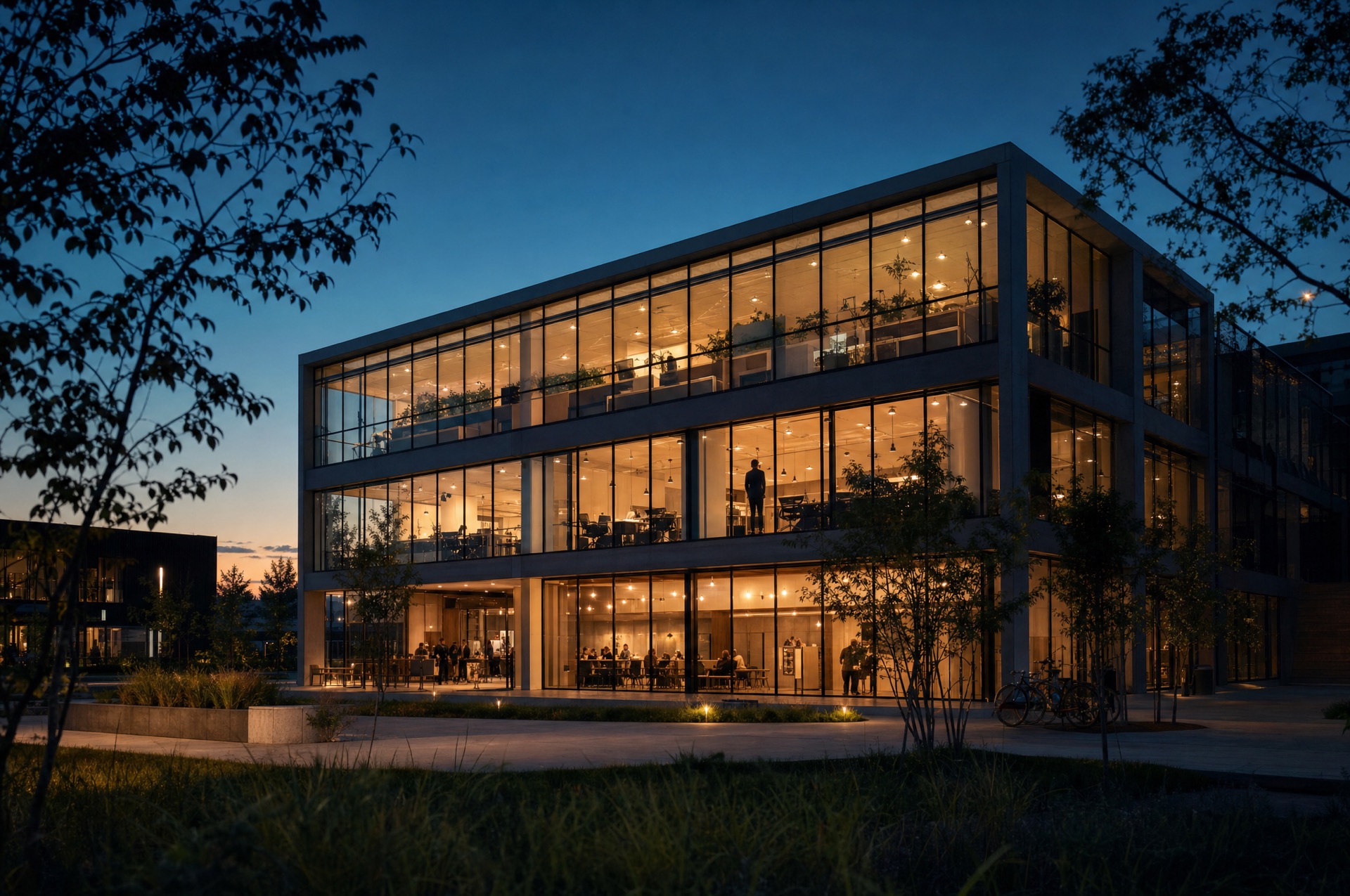 The studio at dusk, every window glowing